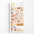 Packaging of a sticker roll with various illustrations on a white background